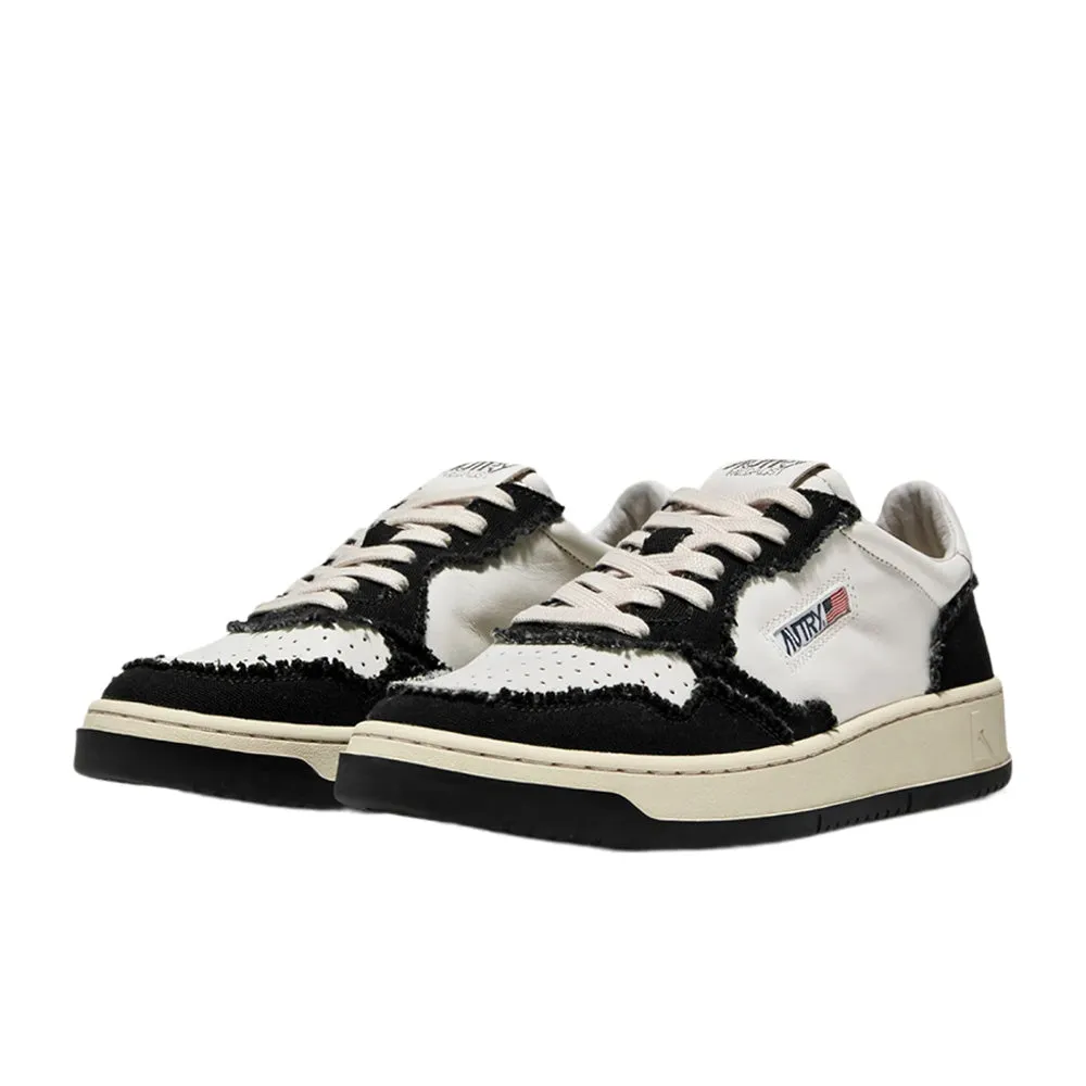 AUTRY UNISEX TWO-TONE MEDALIST LOW SNEAKERS IN SOFT GOATSKIN AND FRAYED CANVAS COLOR WHITE AND BLACK